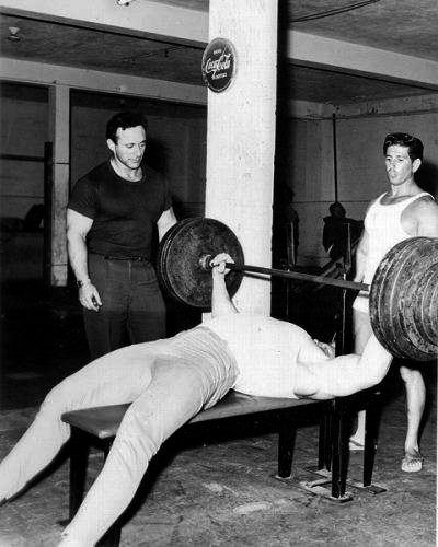 Dave Draper, heavy bench press.